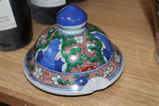 A pair of Chinese porcelain wucai jars and covers, late 19th/early 20th century height 36cm (a.f.)